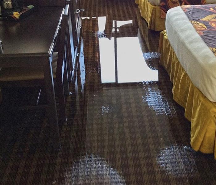 Water overflow in hotel room 